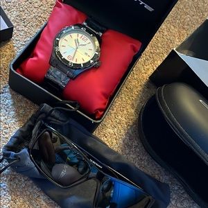 Corvette watch, sunglasses and suitcase and travel bag as a kit. Brand new